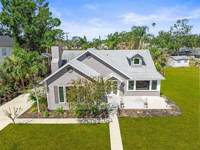 308 Chauncey Ave, Bradenton, FL 34208 - view of front of home featuring a chimney and a front yard