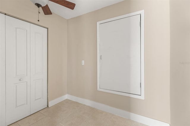308 Chauncey Ave, Bradenton, FL 34208 - unfurnished bedroom with a closet, light tile patterned floors, baseboards, and ceiling fan