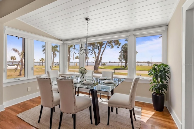 308 Chauncey Ave, Bradenton, FL 34208 - sunroom with a wealth of natural light and a notable chandelier