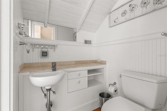 308 Chauncey Ave, Bradenton, FL 34208 - bathroom featuring wooden ceiling, toilet, visible vents, a sink, and vaulted ceiling