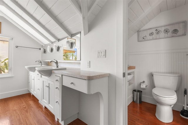 308 Chauncey Ave, Bradenton, FL 34208 - bathroom featuring vanity, toilet, lofted ceiling with beams, and wood finished floors