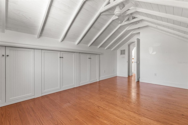 308 Chauncey Ave, Bradenton, FL 34208 - interior space featuring baseboards, light wood-style floors, and vaulted ceiling with beams