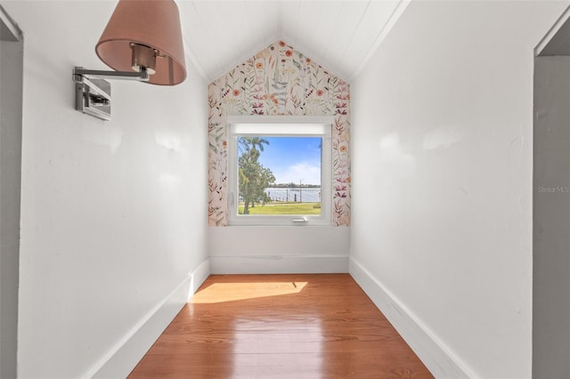 308 Chauncey Ave, Bradenton, FL 34208 - bonus room featuring vaulted ceiling, baseboards, and wood finished floors