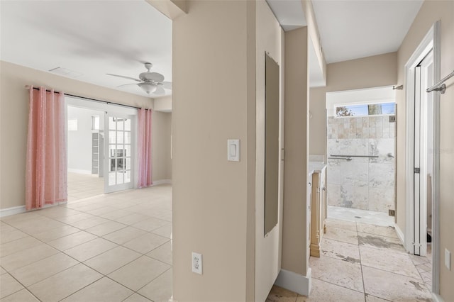 308 Chauncey Ave, Bradenton, FL 34208 - corridor featuring light tile patterned flooring and baseboards