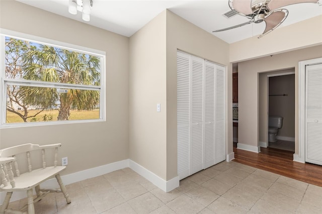 308 Chauncey Ave, Bradenton, FL 34208 - unfurnished bedroom with baseboards and a ceiling fan