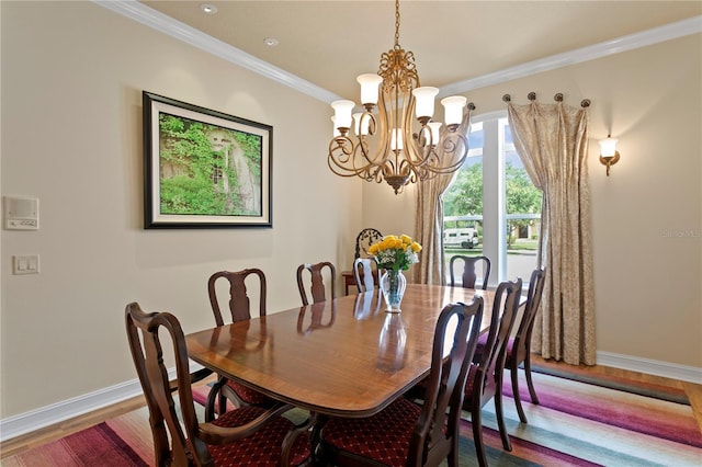 19815 Sea Rider Way, Lutz, FL 33559 - dining room featuring a chandelier, wood finished floors, baseboards, and ornamental molding