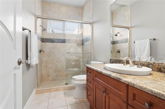 19815 Sea Rider Way, Lutz, FL 33559 - bathroom featuring toilet, tile patterned floors, a stall shower, and vanity