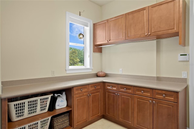 19815 Sea Rider Way, Lutz, FL 33559 - kitchen featuring light countertops and brown cabinets