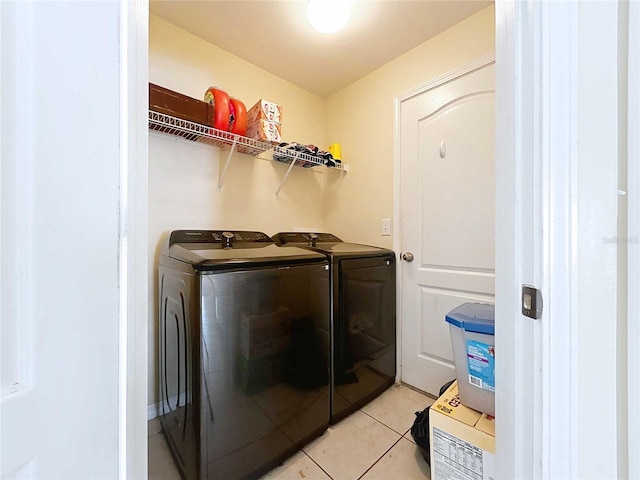 7504 Turtle View Dr, Ruskin, FL 33573 - laundry area featuring independent washer and dryer and light tile patterned floors