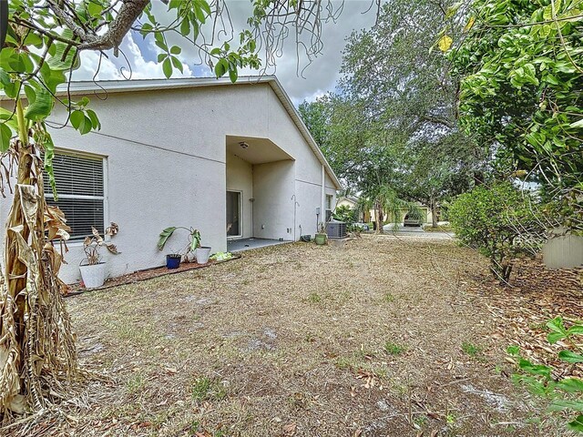 7504 Turtle View Dr, Ruskin, FL 33573 - view of property exterior featuring stucco siding