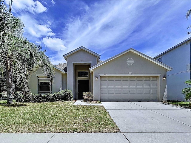 7504 Turtle View Dr, Ruskin, FL 33573 - ranch-style house with stucco siding, an attached garage, concrete driveway, and a front lawn