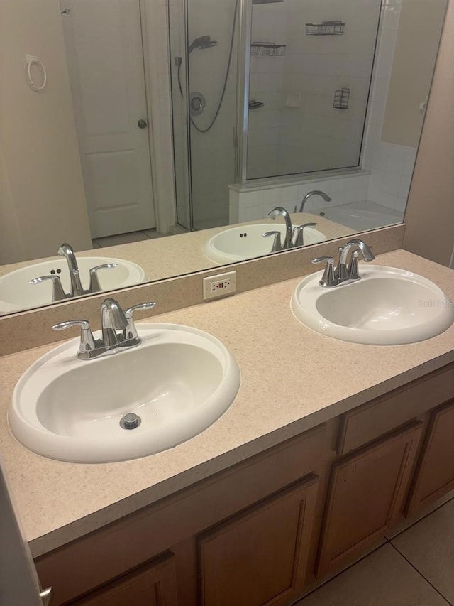 7504 Turtle View Dr, Ruskin, FL 33573 - full bathroom featuring double vanity and a shower stall