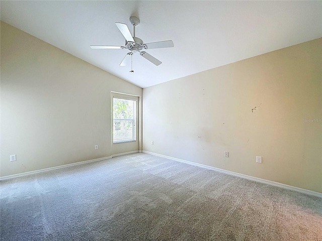 7504 Turtle View Dr, Ruskin, FL 33573 - unfurnished room featuring light carpet, a ceiling fan, and vaulted ceiling