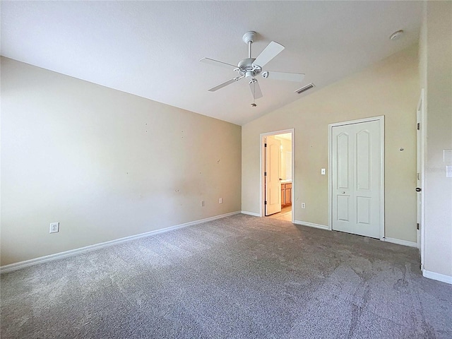 7504 Turtle View Dr, Ruskin, FL 33573 - unfurnished bedroom with lofted ceiling, carpet, and ceiling fan