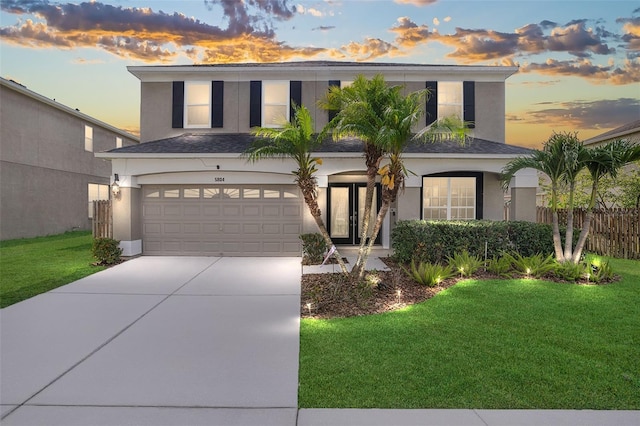 5804 Butterfield St, Riverview, FL 33578 - view of front of property with stucco siding, a garage, concrete driveway, and roof with shingles