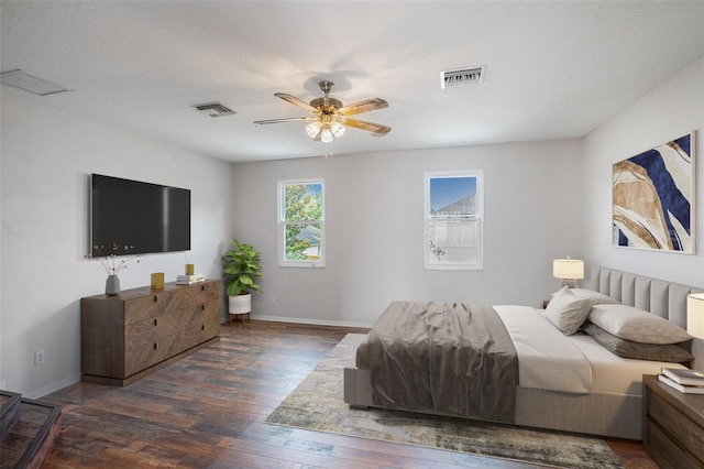 5804 Butterfield St, Riverview, FL 33578 - bedroom with wood finished floors, baseboards, and a ceiling fan
