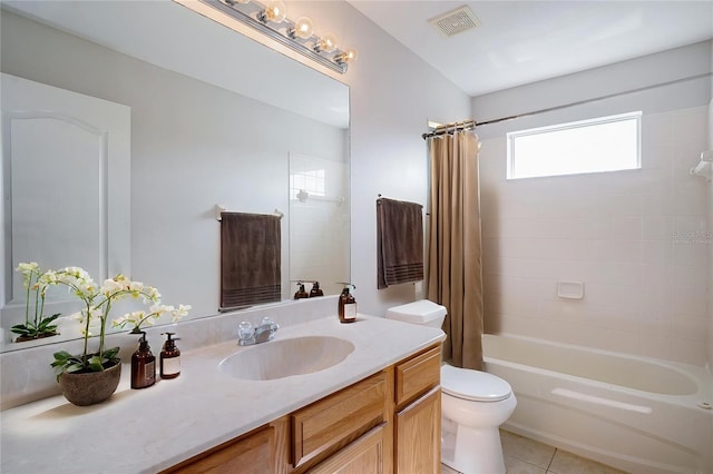 5804 Butterfield St, Riverview, FL 33578 - bathroom with vanity, toilet, shower / bathtub combination with curtain, and tile patterned floors