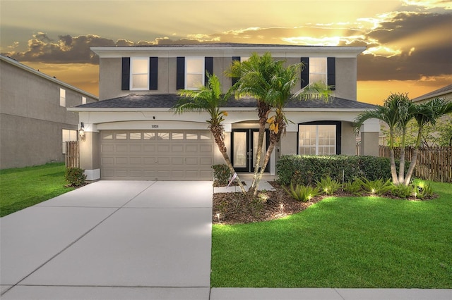 5804 Butterfield St, Riverview, FL 33578 - view of front facade featuring stucco siding, an attached garage, and driveway