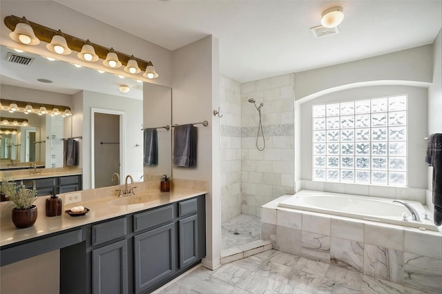 5804 Butterfield St, Riverview, FL 33578 - full bath featuring marble finish flooring, a garden tub, vanity, and a tile shower