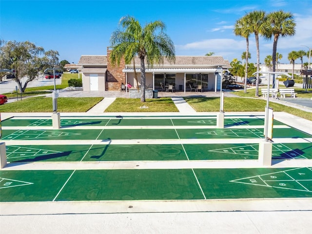 view of community featuring shuffleboard