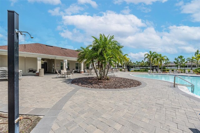 11606 Kilkenny Coral Dr, Riverview, FL 33579 - community pool featuring a patio