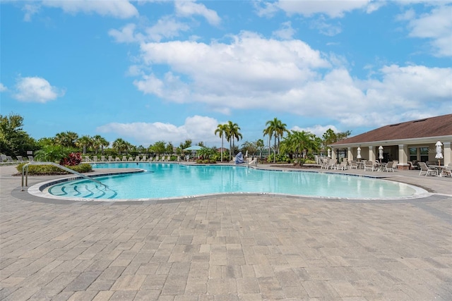 11606 Kilkenny Coral Dr, Riverview, FL 33579 - community pool featuring a patio