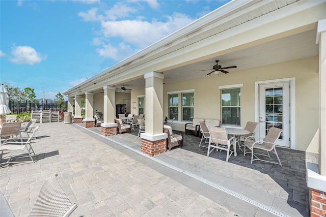 11606 Kilkenny Coral Dr, Riverview, FL 33579 - view of patio / terrace featuring a ceiling fan, outdoor dining area, and an outdoor living space