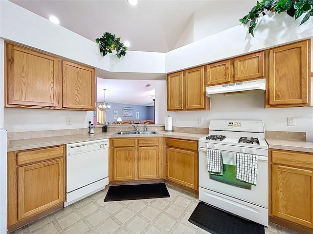 24305 Denali Ct, Lutz, FL 33559 - kitchen with white appliances, a sink, under cabinet range hood, lofted ceiling, and light countertops