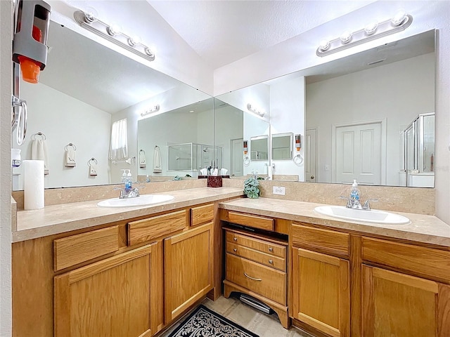 24305 Denali Ct, Lutz, FL 33559 - bathroom featuring a shower stall, vanity, and lofted ceiling