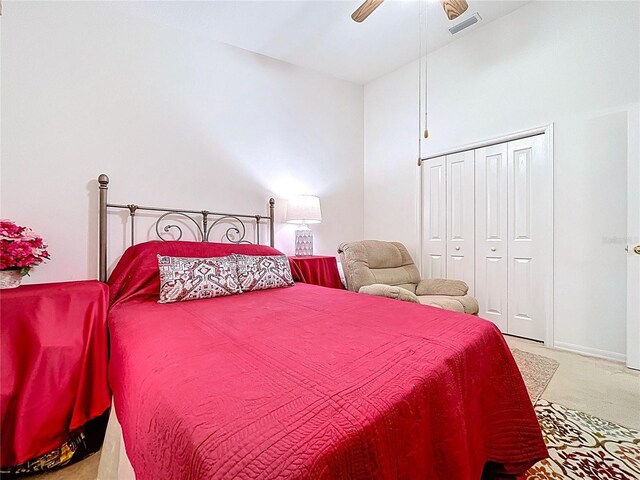 24305 Denali Ct, Lutz, FL 33559 - bedroom featuring carpet floors, a closet, and a ceiling fan