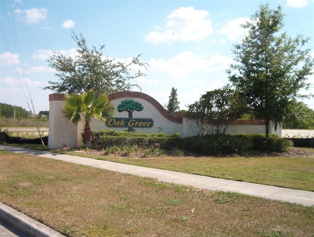 24305 Denali Ct, Lutz, FL 33559 - community / neighborhood sign featuring a lawn