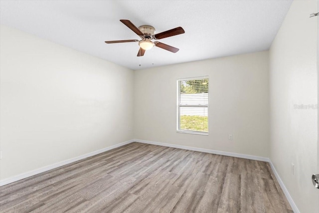 2906 E Columbus Dr, Tampa, FL 33605 - empty room with ceiling fan, baseboards, and light wood-type flooring