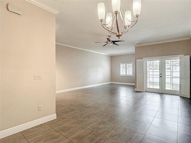 tiled empty room with ornamental molding, a textured ceiling, baseboards, and ceiling fan with notable chandelier