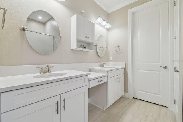 full bathroom featuring two vanities, crown molding, and a shower with shower door