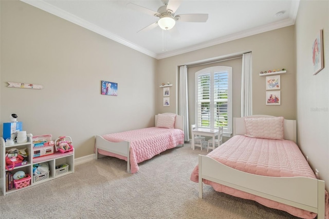bedroom with crown molding, carpet, and ceiling fan
