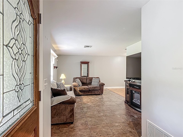 9679 W Pimpernel Ln, Crystal River, FL 34429 - living area with baseboards and visible vents