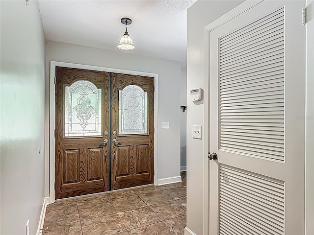9679 W Pimpernel Ln, Crystal River, FL 34429 - foyer entrance with french doors and baseboards