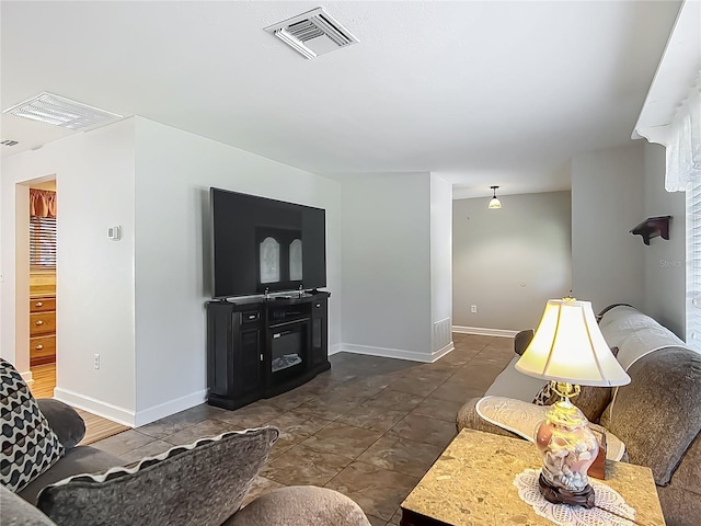 9679 W Pimpernel Ln, Crystal River, FL 34429 - living room with baseboards and visible vents