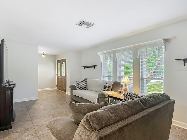 9679 W Pimpernel Ln, Crystal River, FL 34429 - living room with baseboards and visible vents