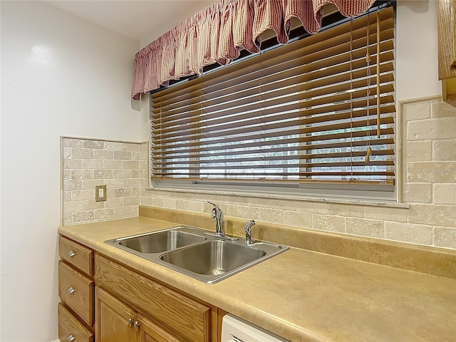 9679 W Pimpernel Ln, Crystal River, FL 34429 - kitchen with light countertops, tasteful backsplash, and a sink