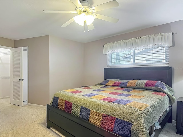 9679 W Pimpernel Ln, Crystal River, FL 34429 - carpeted bedroom featuring baseboards and ceiling fan