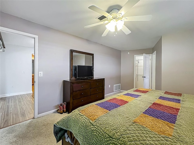 9679 W Pimpernel Ln, Crystal River, FL 34429 - bedroom with carpet flooring, visible vents, baseboards, and ceiling fan
