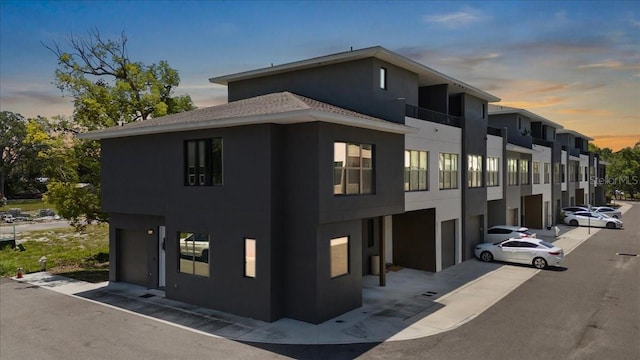 8723 Palm Ranches Pl, Tampa, FL 33614 - view of building exterior with a garage and driveway