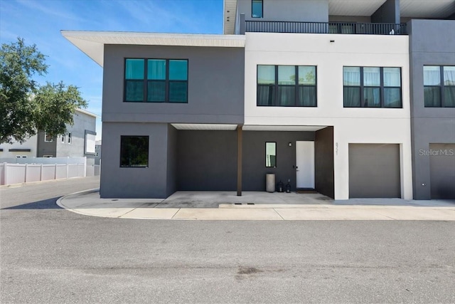 8723 Palm Ranches Pl, Tampa, FL 33614 - view of front of house featuring stucco siding and a garage