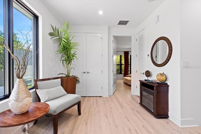 8723 Palm Ranches Pl, Tampa, FL 33614 - sitting room with light wood-type flooring, baseboards, and recessed lighting