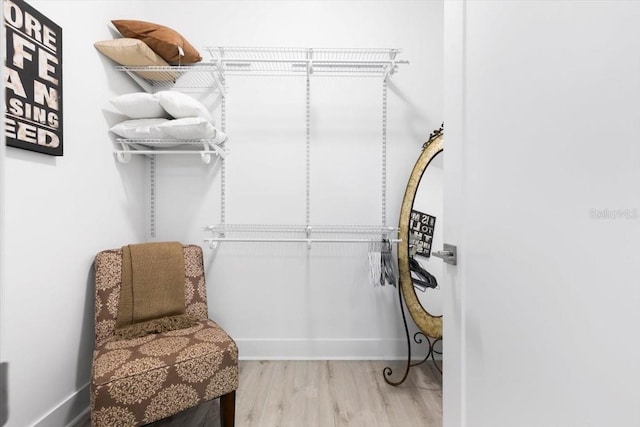 8723 Palm Ranches Pl, Tampa, FL 33614 - walk in closet featuring wood finished floors