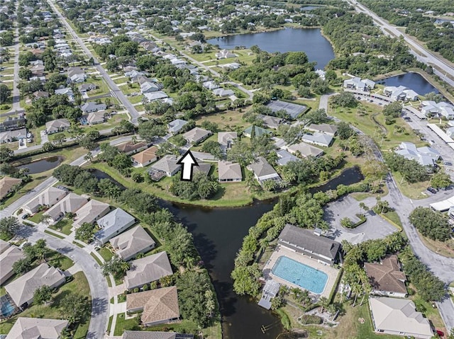 bird's eye view with a water view and a residential view