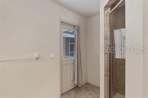 full bath featuring a stall shower