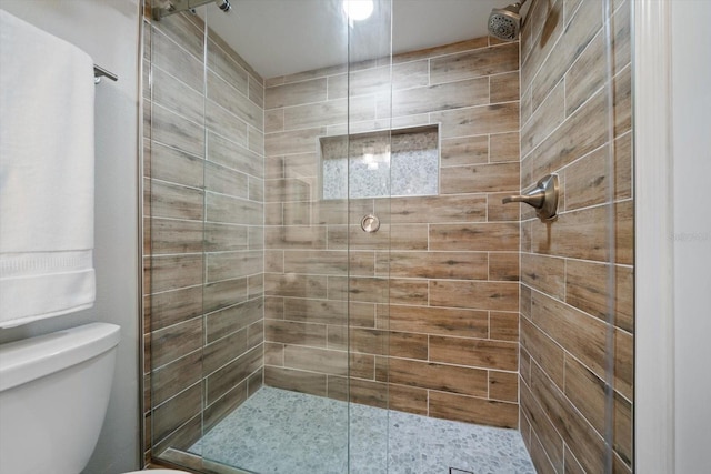 868 Bayway Blvd Unit 206, Clearwater Beach, FL 33767 - bathroom with a shower stall and toilet