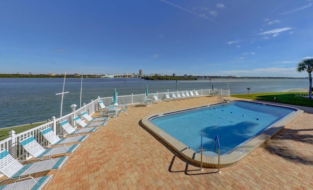868 Bayway Blvd Unit 206, Clearwater Beach, FL 33767 - community pool featuring a water view and fence